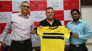 FCV International Football Academy, Head Coach Tony Walmsley (centre) hold up the training shirt and is flanked by SRS Sporting Director, Amit Desai (left) and SRS Sports, Head Coach, Firmin D’Souza at press conference on Thursday to announce the launch of the Academy.