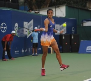 Indian Ankita Raina in action against unseeded Peangtarn Plipuech of Thailand during their second round match of  the L&T Mumbai Open WTA 125K Series,  